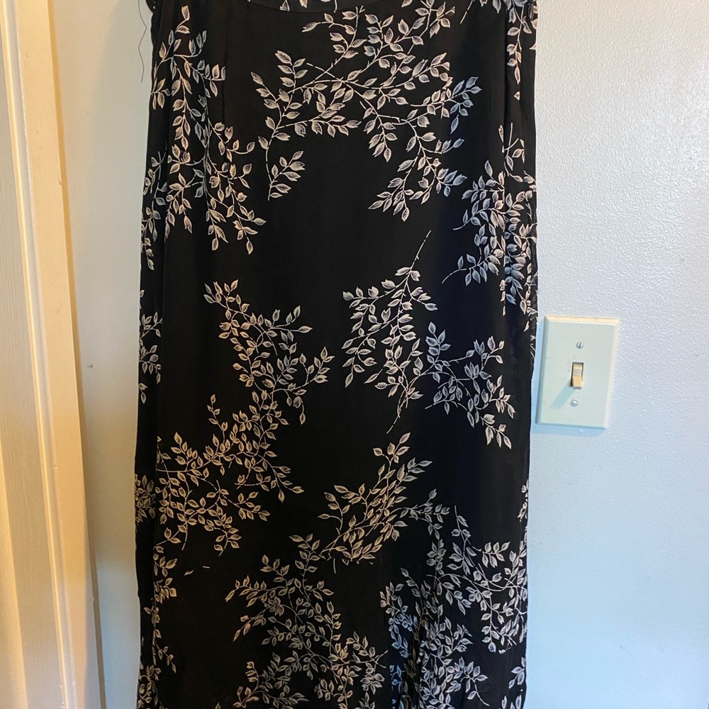 White botanical on black skirt